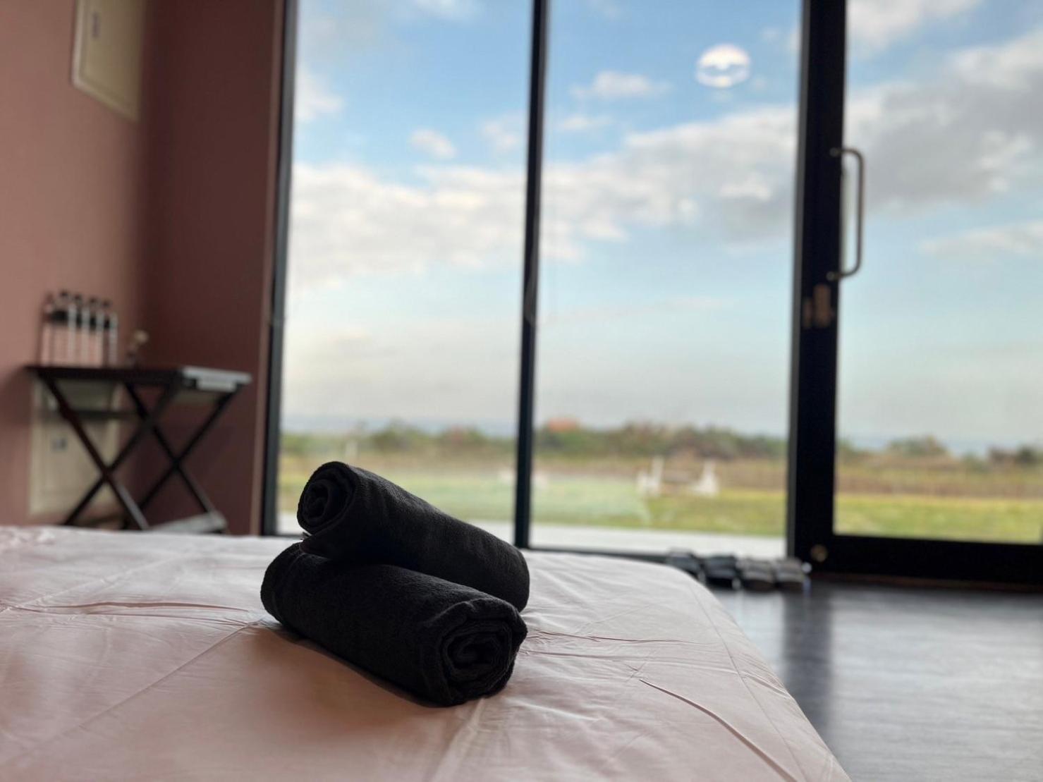 Lugo Hotel Manzhou Luaran gambar